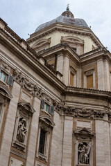 The image showcases the majestic facade of Basilica di Santa Maria Maggiore in Rome, Italy, highlighting its impressive architecture and intricate details.