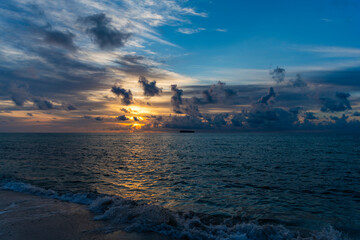 Sunset seascape at summer vacation. Sunrise with sea beach. Calm horizon view at sea on sunset. Romantic summer vacation at seascape. Dramatic sunset. Sea sunrise on ocean beach. Sunset silhouette