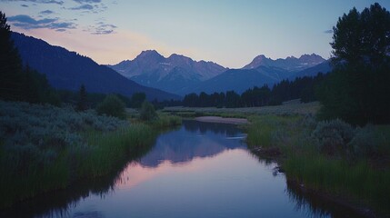   A river runs through a verdant forest, with a sky of mixed pink and blue hues and mountains in the distance