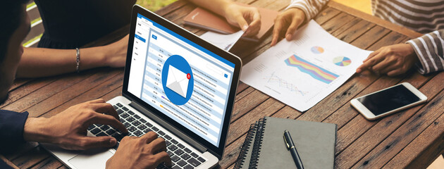 Email notification message showing on computer screen snugly. Digital marketing message information text from business to customer client