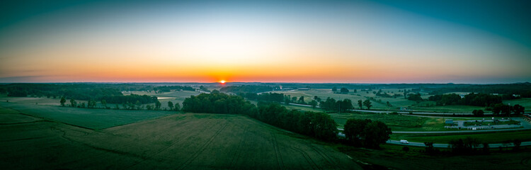 Fields surrounding the Western Kentucky Parkway near the city of Beaver Dam and the highway service area.