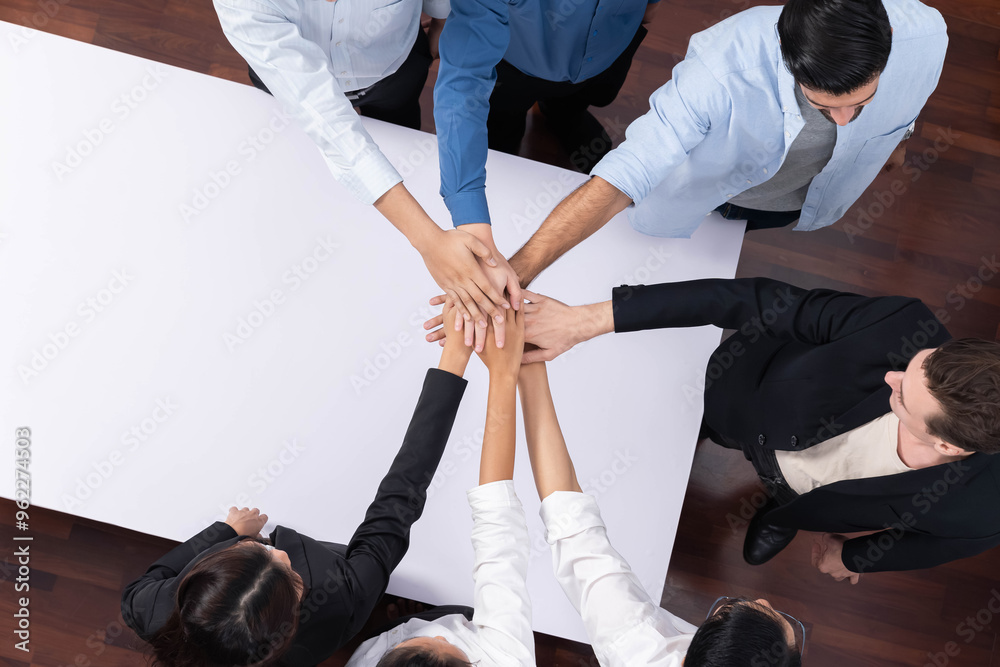 Aufkleber panorama banner top view group of diverse office worker join hand over meeting table. business syner