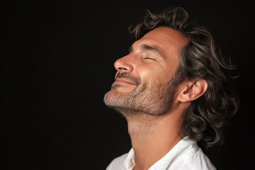 Obraz premium a close up of a man's face looking to a side