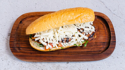 Delicious doner kebab on wooden tray