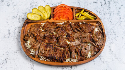 Delicious porion doner kebab with fries and vegetables