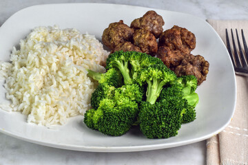 rice  with meatballs and  broccoli