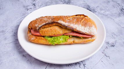 Italian ham sandwich on plate