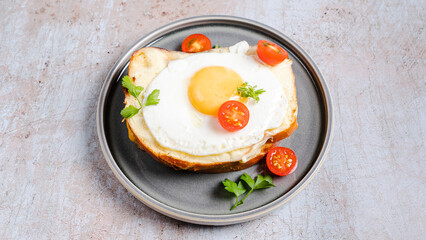 Bruschetta with fried egg on