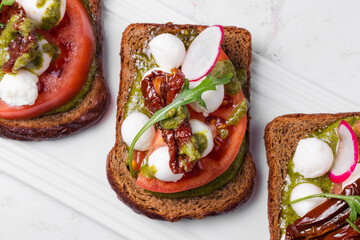 Bruschettas with tomatoes and mozzarella