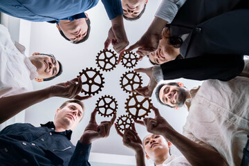 Business team joining cogwheel in circular together symbolize successful group of business partnership and strong collective unity teamwork in community workplace with productive efficiency. Prudent