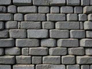 A seamless gray stone wall texture with concrete spots, creating a versatile background for your text or design.
