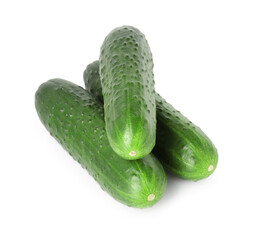 Three fresh green cucumbers isolated on white