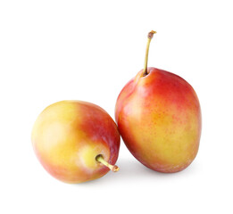 Two fresh ripe plums isolated on white