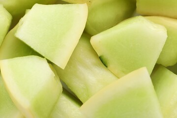 Many pieces of sweet honeydew melon, closeup