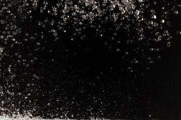 Image of water splashing in the dark