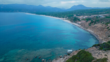 Coast of Sardinia, house on the sea at sunset
