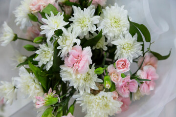 A bouquet of pink and white flowers with a perfect vibe.