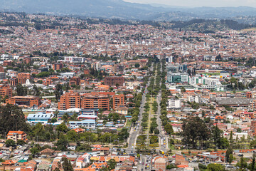 Panoramic view from above of the city of Cuenca in the valley from the Turi viewpoint, the southern hill of the city. Ecuador