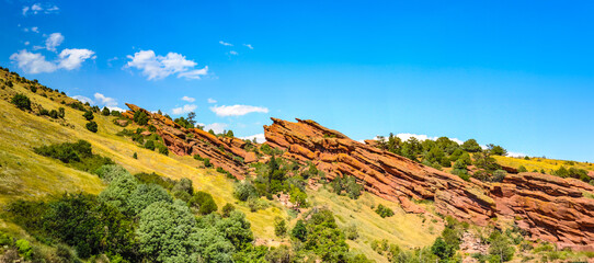 Red Rock, Colorado, is where the Red Rocks Amphitheatre was built into the rocks southwest of Denver. Several additional significant sandstone formations are in the area.