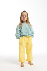 Portrait of beautiful cute little toddler girl. Child with funny face. Pretty smile kid in studio on white background. High quality photo