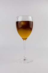 glass with cold iced coffee on a white background
