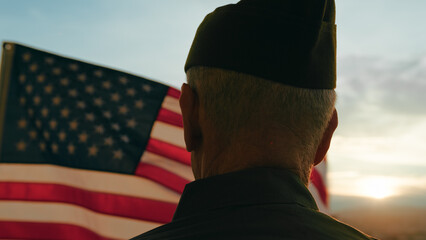 Elderly Man Stand Against American Flag For Veterans Day Holiday