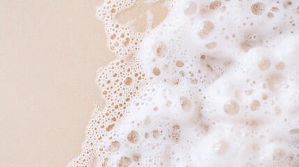 Textured Sea Foam Patterns on Sandy Beach, soft waves intertwining with golden sand, minimalist composition, serene atmosphere, inviting space for reflection and tranquility