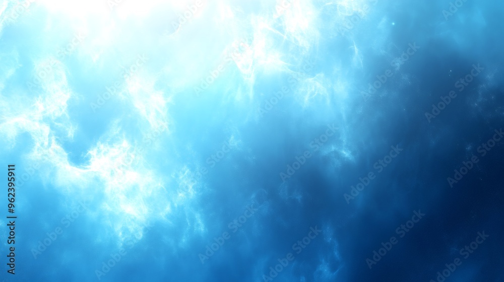 Wall mural abstract blue and white background with light rays and glowing particles.