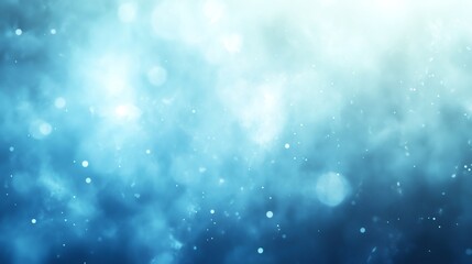 Obraz premium Abstract blue bokeh background with white blurred lights.