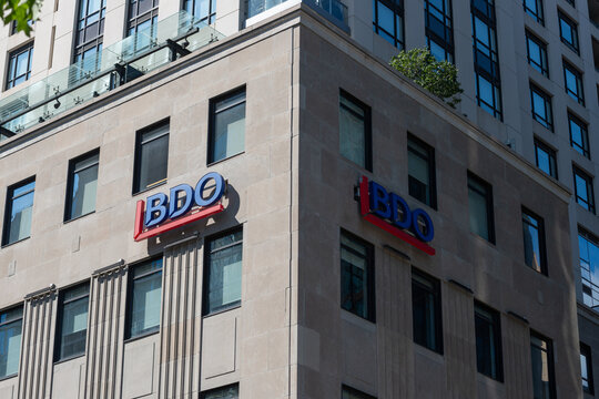 exterior building and sign of BDO Canada LLP - Corporate, an accounting firm, located at 20 Wellington Street East at Scott Street in Toronto, Canada