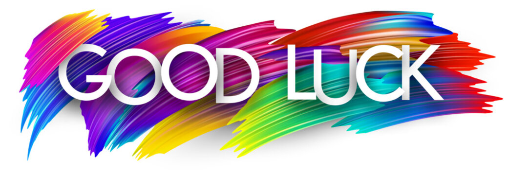 Good luck paper word sign with colorful spectrum paint brush strokes over white. Vector illustration.