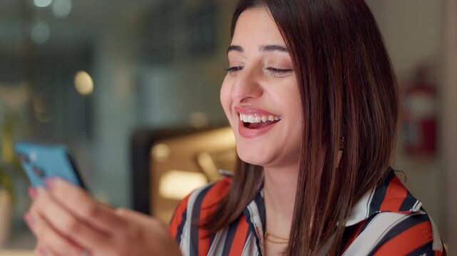 Phone, typing or business woman laugh at text message, email or meme online at startup. Mobile, funny or happy worker on chat app for joke, break or comedy script writer at night on deadline closeup