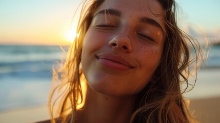 A serene close-up of a smiling person at the beach during sunset, capturing joy and tranquility.
