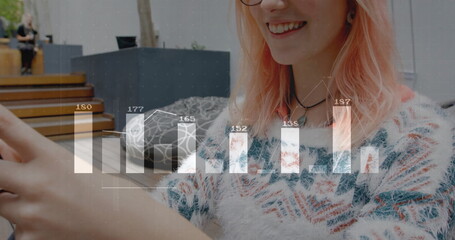 Image of diagrams and data processing over caucasian businesswoman using smartphone