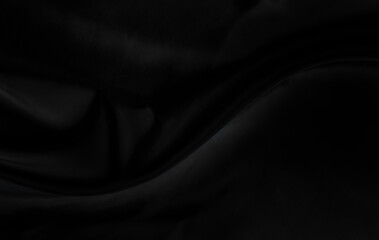 Black gray satin dark fabric texture luxurious shiny that is abstract silk cloth panorama background with patterns soft waves blur beautiful.