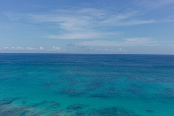 A view of the endless blue sea. Beautiful horizon and clear sea water