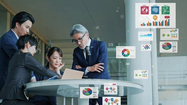 ロビーで会議するビジネスパーソンのグループとビジネスデータ