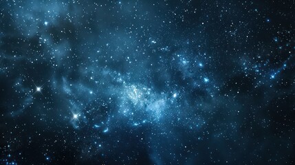 Obraz premium A Deep Blue Night Sky Filled with Stars and Nebulae