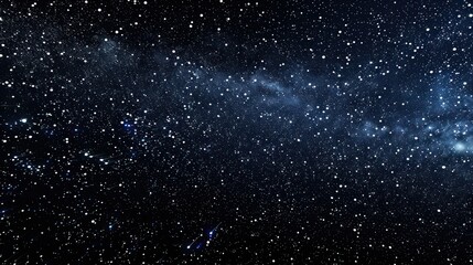 Obraz premium A Night Sky Filled with Stars and Shooting Stars