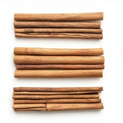 A collection of cinnamon sticks arranged in three rows on a white background.