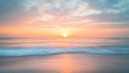 Fototapeta premium Calm Ocean Waves at Sunset with Soft Clouds