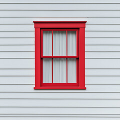 Fototapeta premium Front view of a red window on a green and white wooden house wall. 