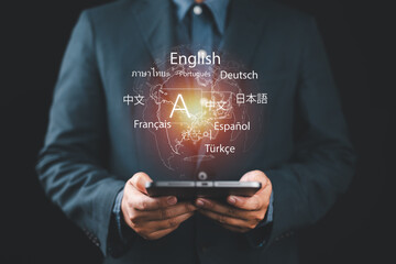 Multilingual Language Translation Technology Concept. A person holding holographic globe with...