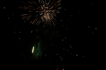 Firework. Colorful festive fireworks, standing out against the black sky. A shot of a bright fireworks explosion. Explosion. Firework. An overlay. new year. christmas, independence day, birthday, holi