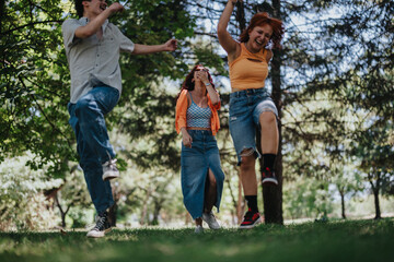 Fototapeta premium Young teenagers having fun in the park displaying friendship, joy, and moments of laughter and happiness. Captures the essence of youthful energy and carefree play.