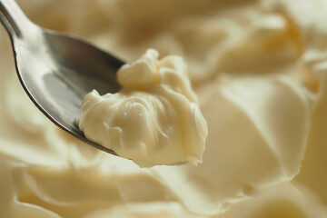 close up of fresh butter in a container 