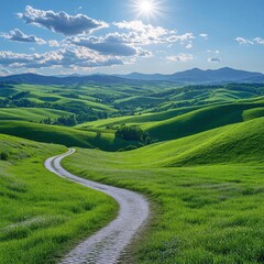 Fototapeta premium Winding Road Through Green Hills Under Sunny Blue Sky