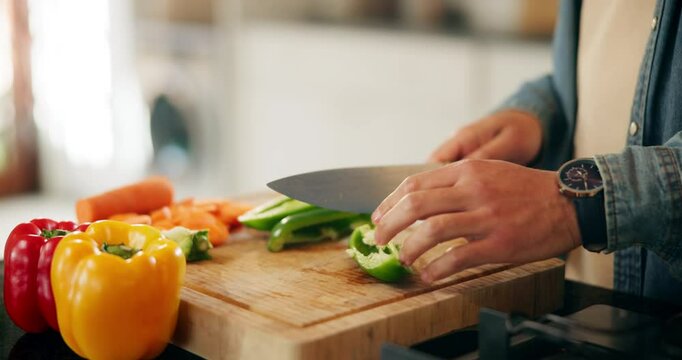 Cutting board, vegetables and hands with knife, kitchen and cooking for lunch, wood and meal prep in home. Bell peppers, recipe and ingredients with organic and chopping of food, hungry and house