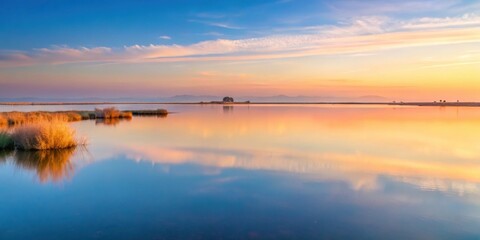Obraz premium Tranquil Valencian lagoon at dawn with soft pastel colors reflecting in the water , Valencian lagoon, dawn, tranquil