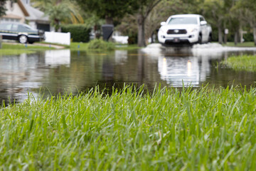 Car driving in flood